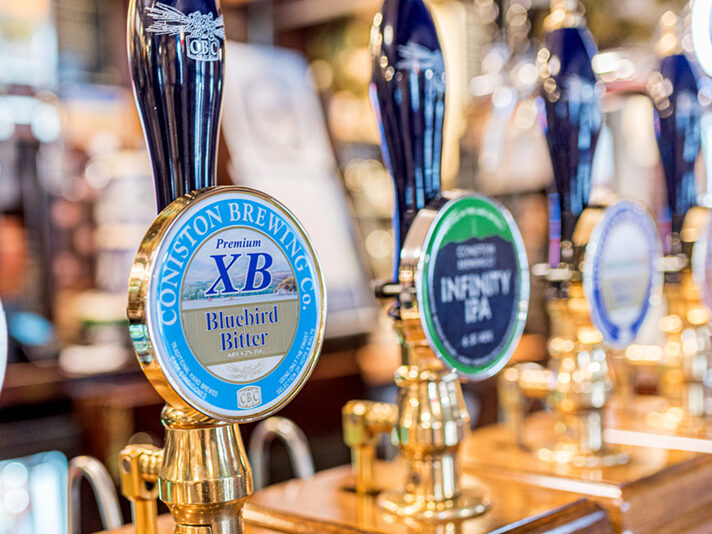 Real ale hand pulls at the Black Bull Inn, Coniston